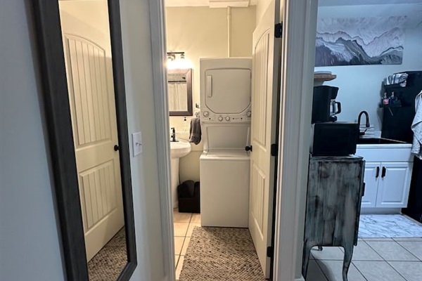 stackable washer and dryer in bathroom
