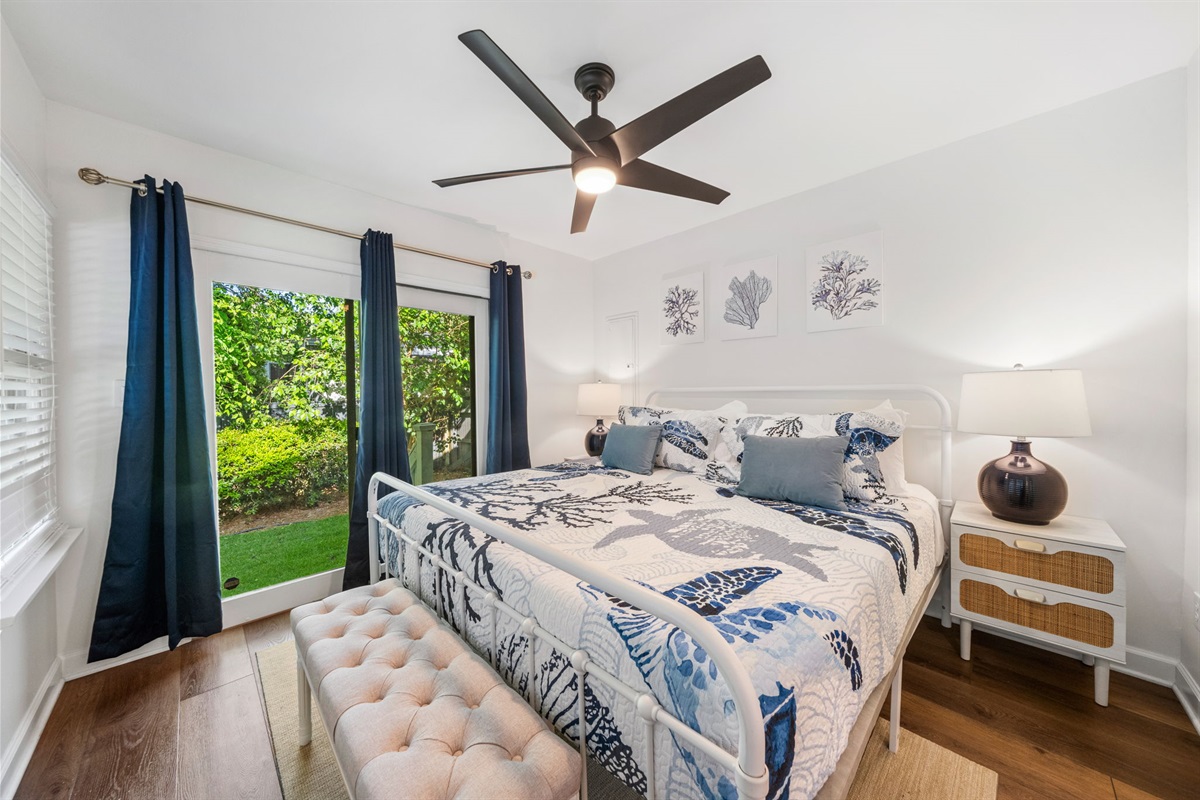 King Bedroom 3 Overlooks The Pool and Has a Private Entrance To Backyard | IOP Escapes Beach Blessing | 3705 Hartnett Blvd, Isle of Palms, SC