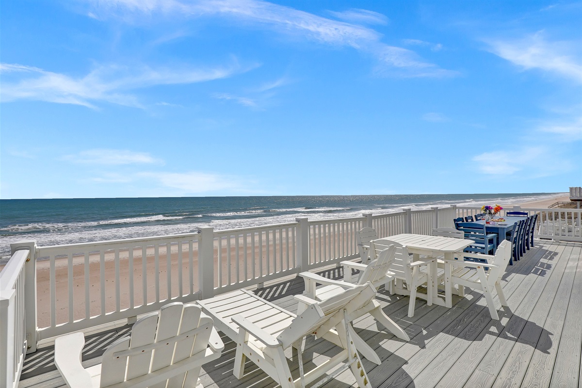 Soak up the sun or enjoy an evening cocktail on our expansive oceanfront deck.