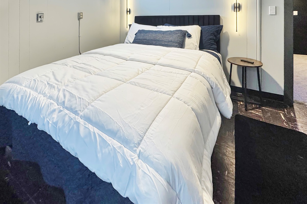 Sleep four in style with this two-queen bedroom featuring plush linens.