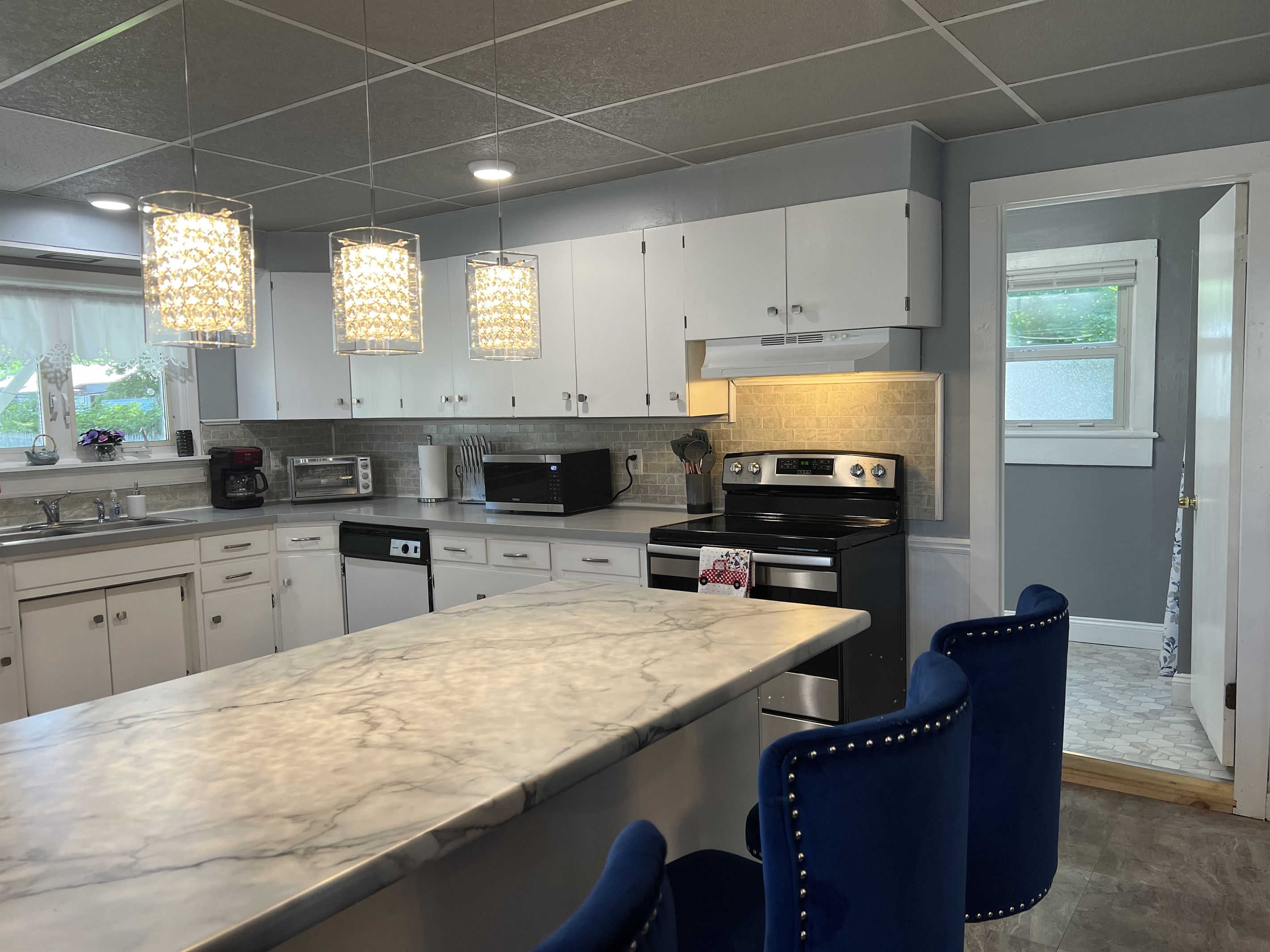 Kitchen island and 1st floor bath to right