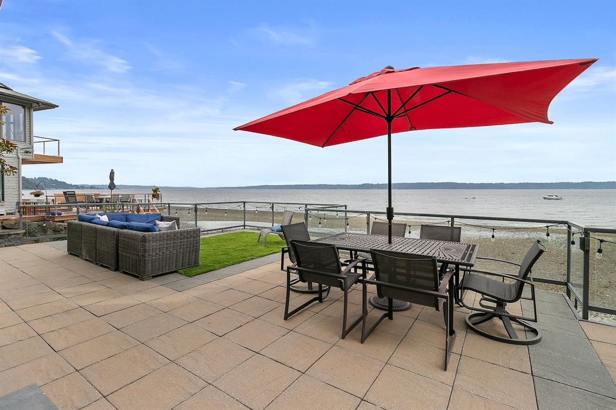 Enjoy breakfast, lunch, and dinner while looking out at this beautiful view. Or relax on the outdoor seating while listening to the water lapping on the shore.