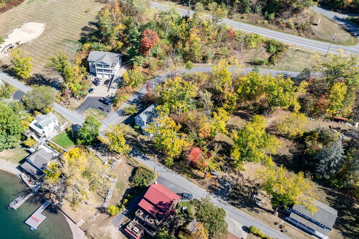 Charming neighborhood surrounded by vibrant fall foliage—ideal for a relaxing getaway