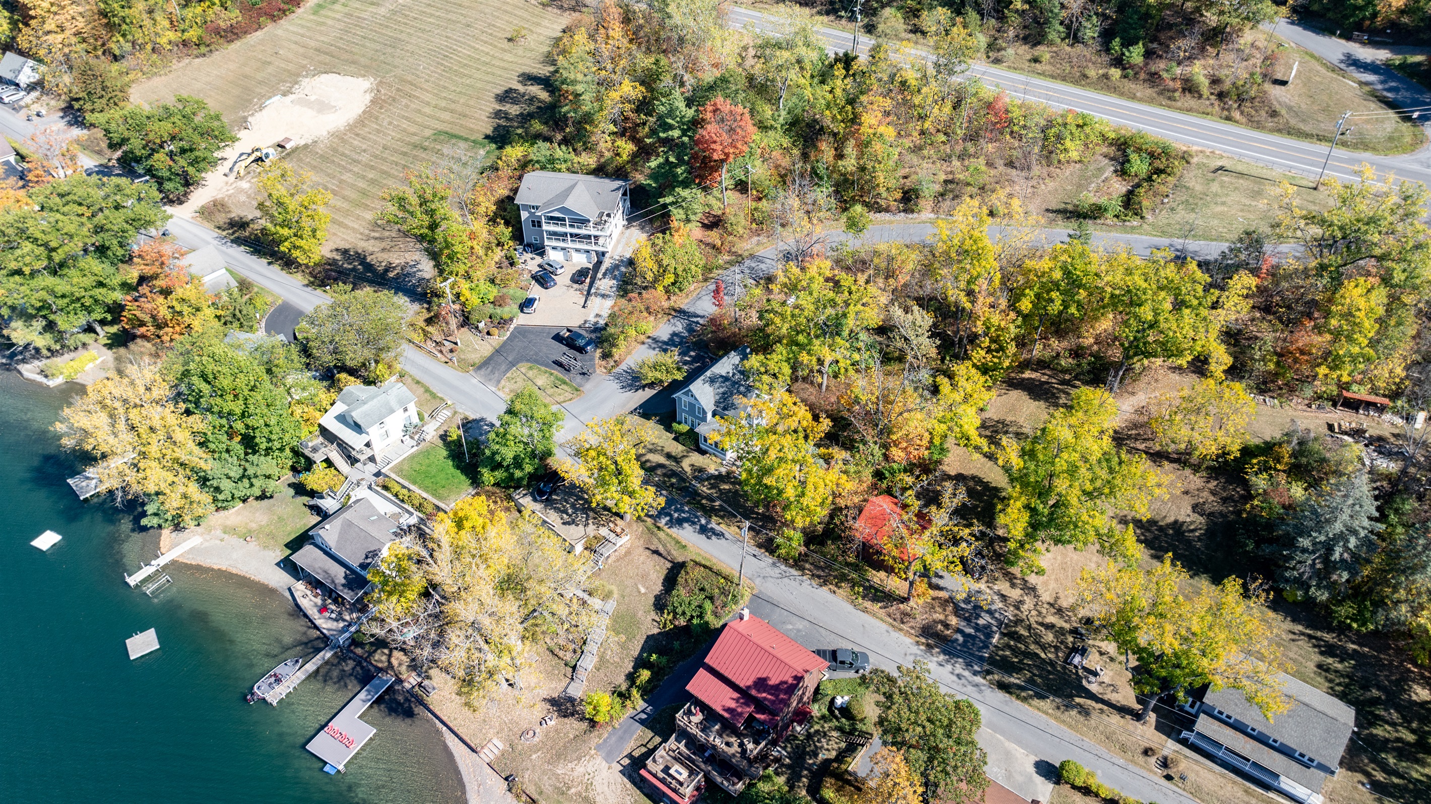 Charming neighborhood surrounded by vibrant fall foliage—ideal for a relaxing getaway