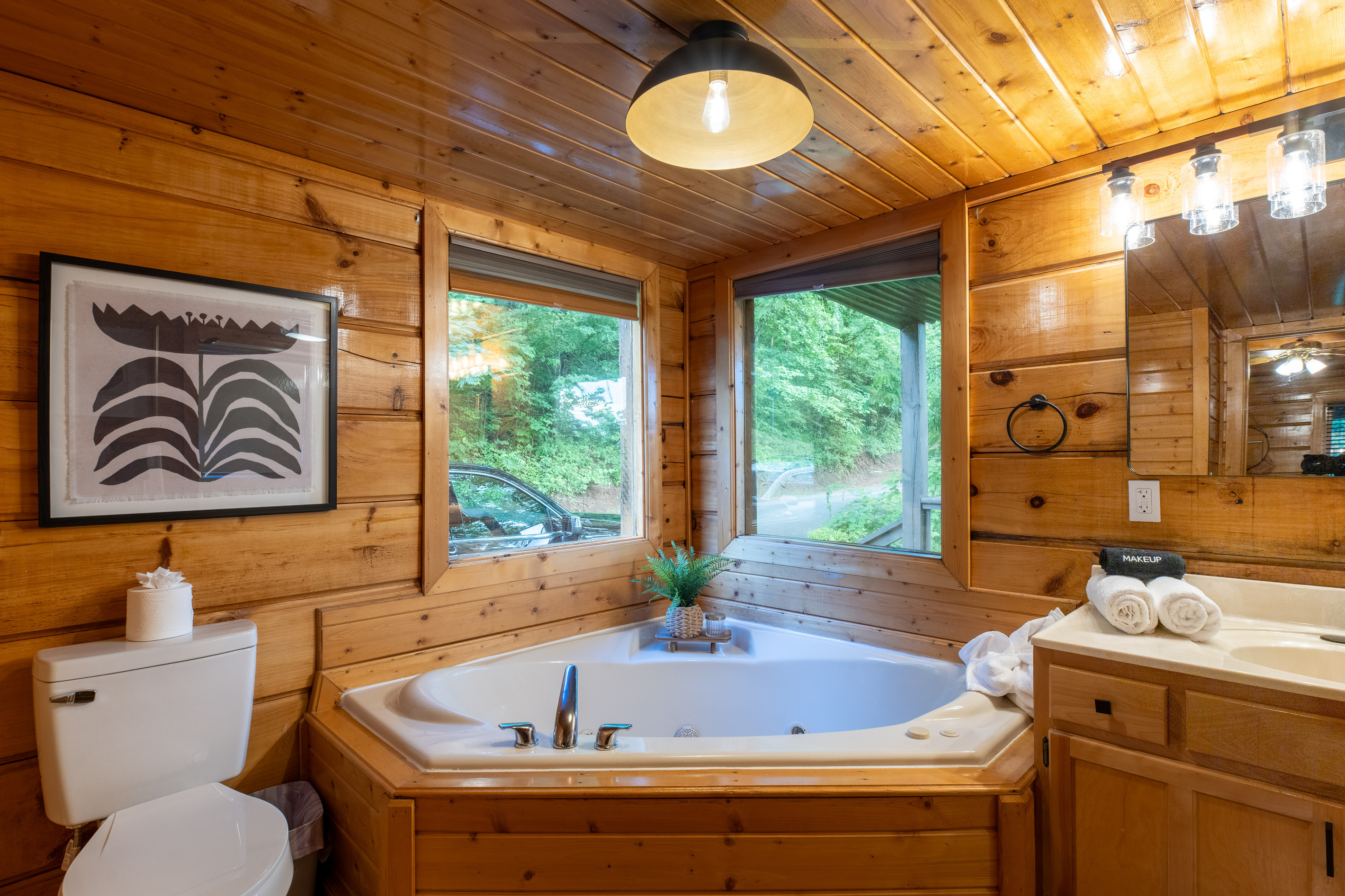 Ensuite bathroom with jetted tubs and shower