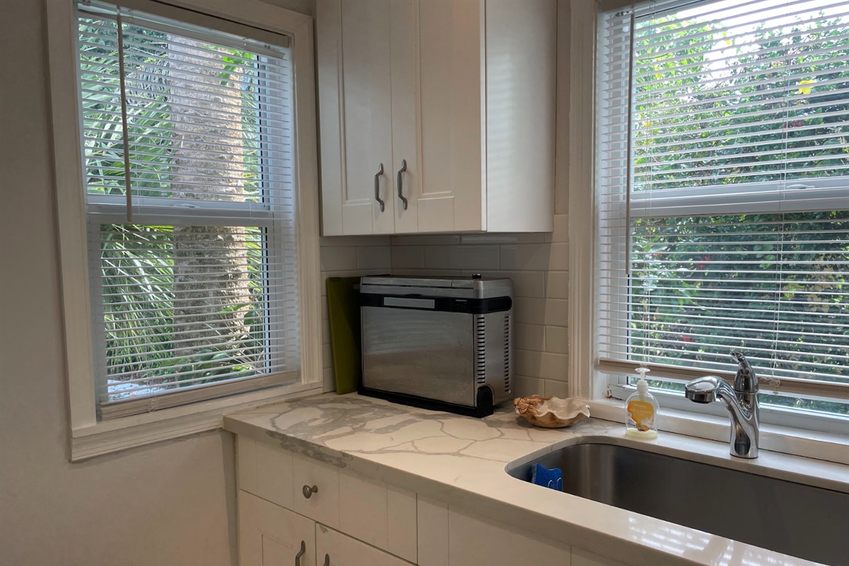 The modern, updated kitchen has all the essentials to make your meals for everyone to enjoy.