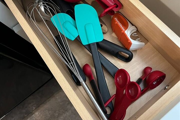 Fully equipped kitchen featuring a range of cooking tools and essentials for meal preparation, and more—designed for convenience and functionality, making it the perfect space for cooking and culinary creativity