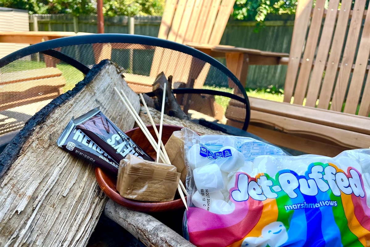 Have fun making s’mores with friends & family by the fire under the stairs! 