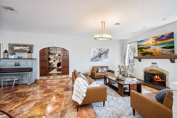 Main level living room a space to gather, to listen and to enjoy each other