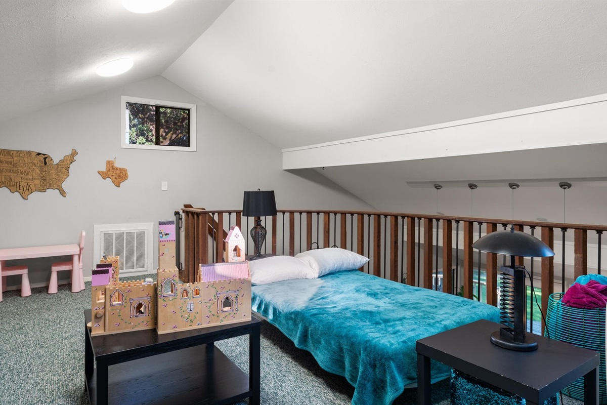 The couch in the children’s loft easily transforms into a bed, adding extra sleeping space for little ones. It’s a great spot for a movie night snooze or for kids who want their own fun.