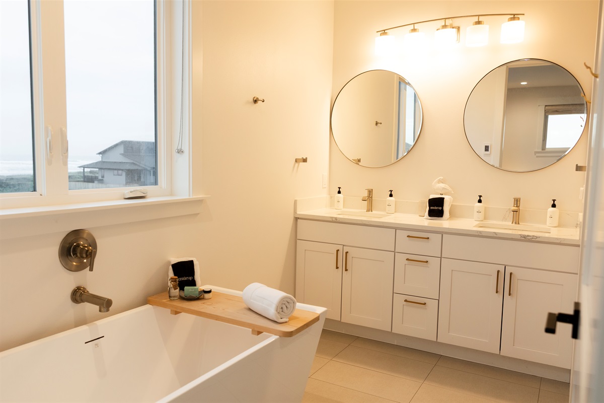 {Master Bathroom} Spa-inspired ensuite with soaking tub and bath salts, heated floors, and thoughtful touches throughout.
