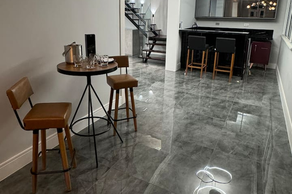 At night, the designer lighting dazzles the modern space. 