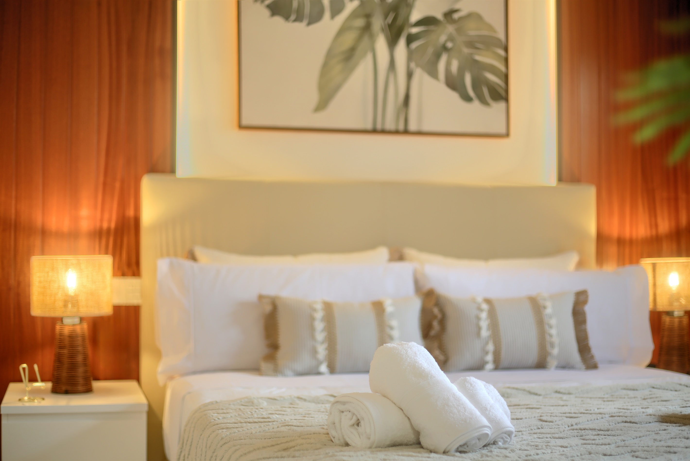 Master bedroom with a double bed, thoughtfully styled to offer a comfortable and cosy resting experience.