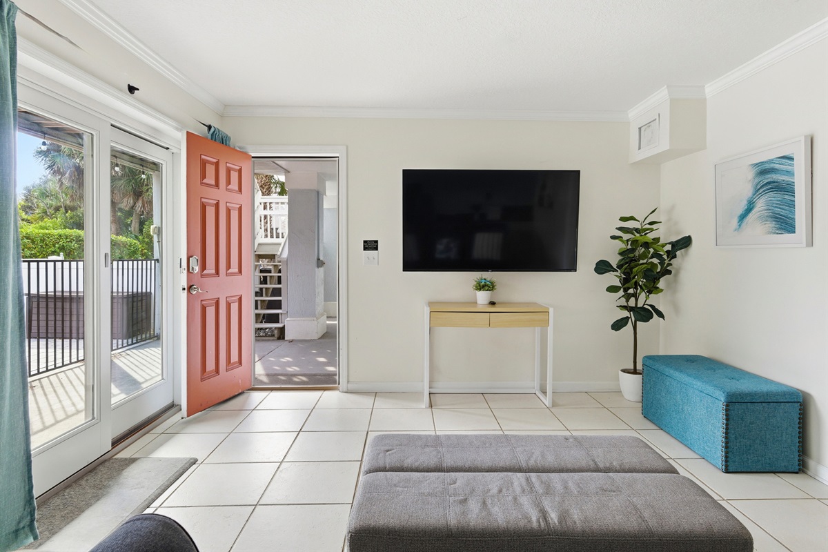 Front sitting room with large TV