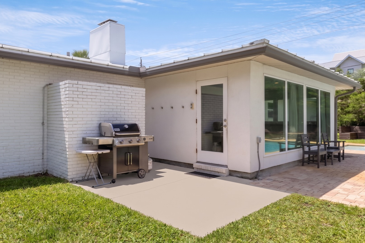 The propane grill makes backyard cookouts part of the experience, adding a flavorful touch to days spent outside.