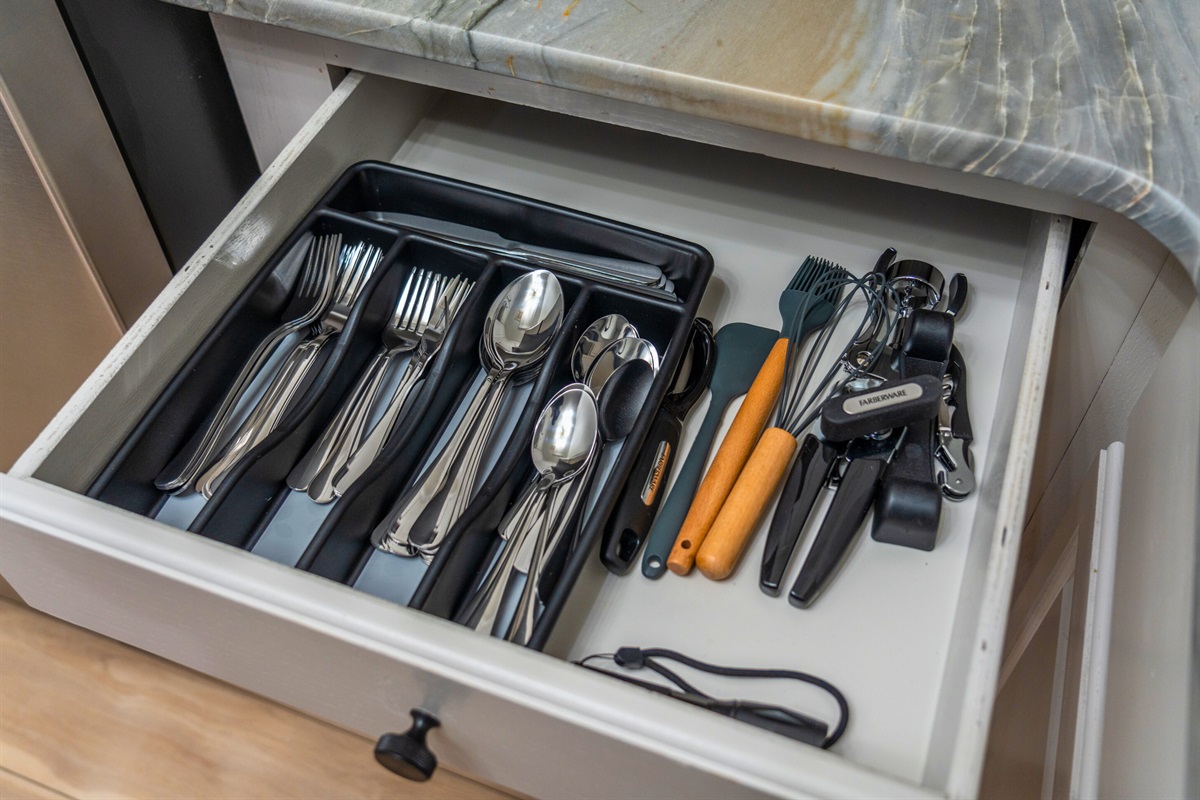 Every drawer is thoughtfully organized with silverware and cooking utensils to ensure you have all the tools you need for your culinary adventures.