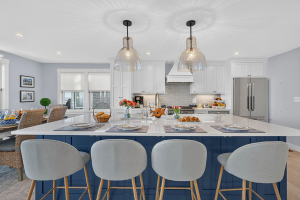 Oversized kitchen island with bar seating, perfect for casual meals and conversation