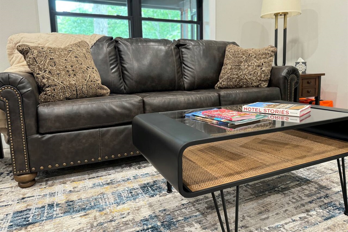 Enjoy modern furnishings with real leather furniture and a sleek contemporary style. 