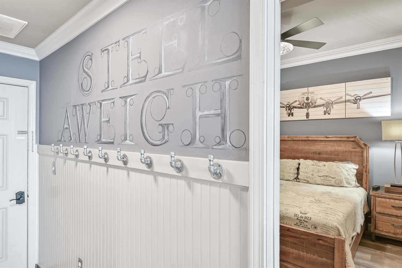 Foyer with hooks for beach towels and laundry and shopping bags!