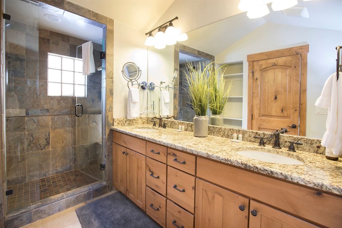 Master bath with dual vanity sink, tub and walk in shower