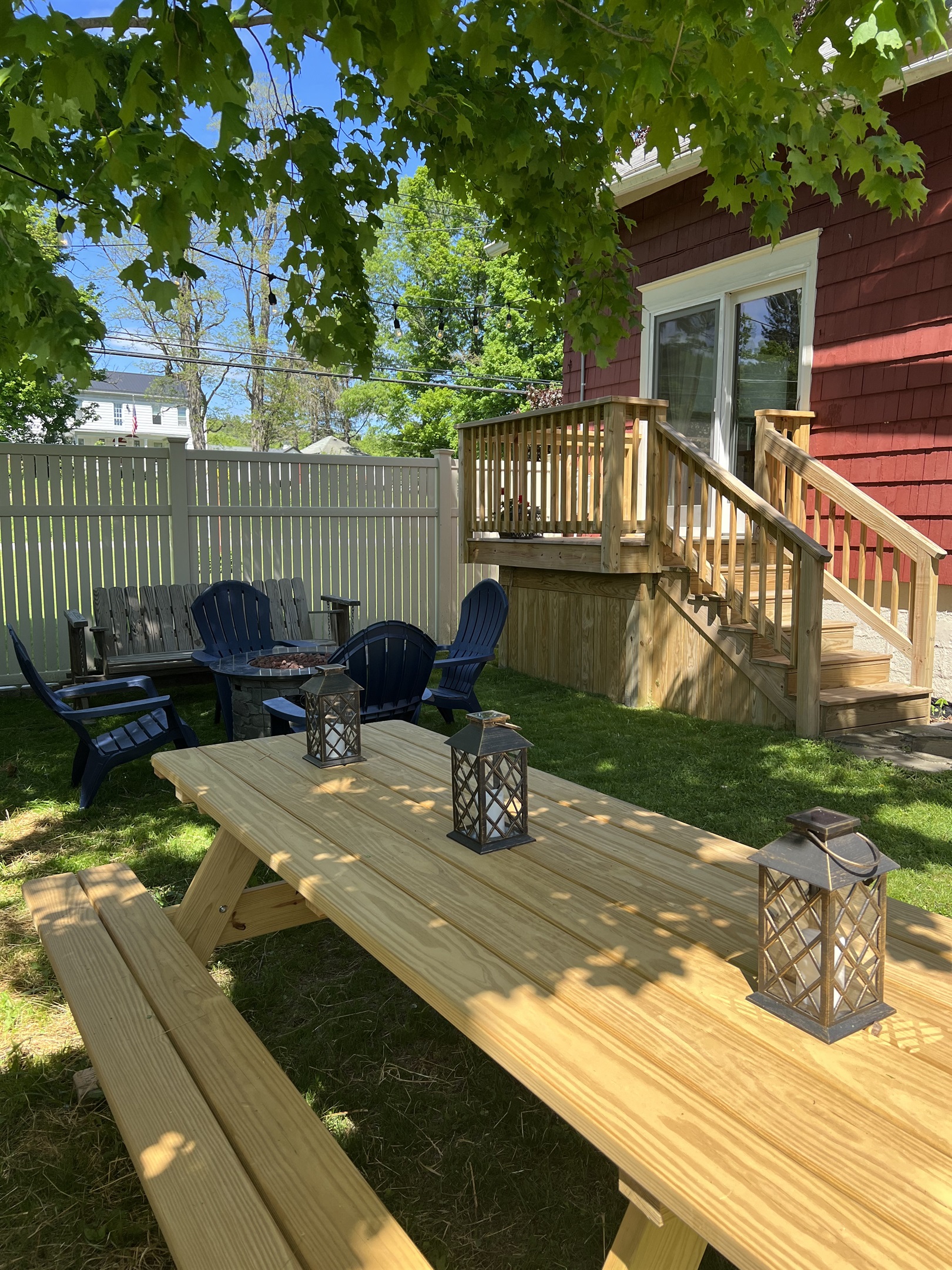 Peaceful backyard for dining and relaxing around the fire pit.