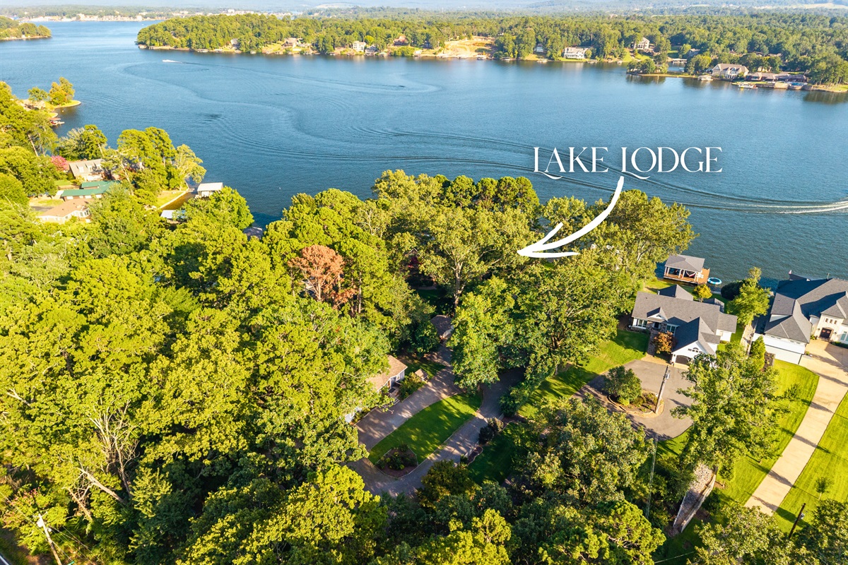 Aerial view of Lake Lodge, perfectly perched on the water&rsquo;s edge.