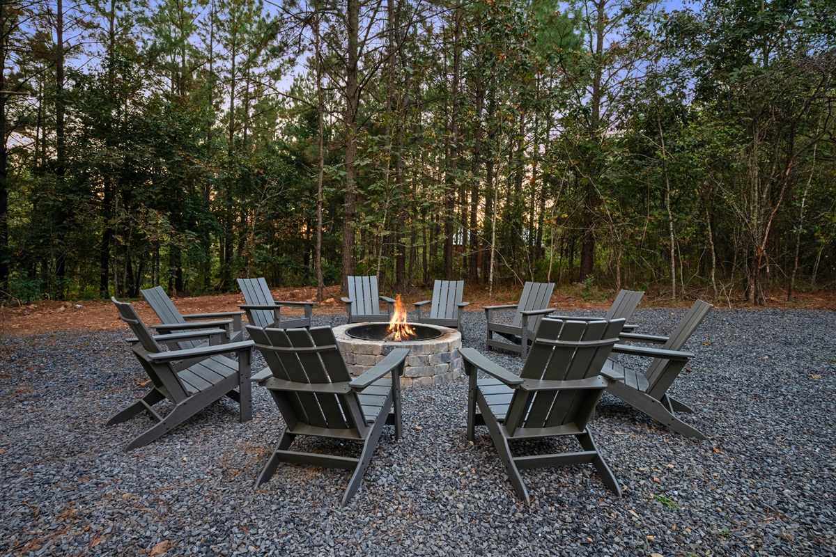 Share stories and roast marshmallows under the stars around this cozy outdoor fire pit.