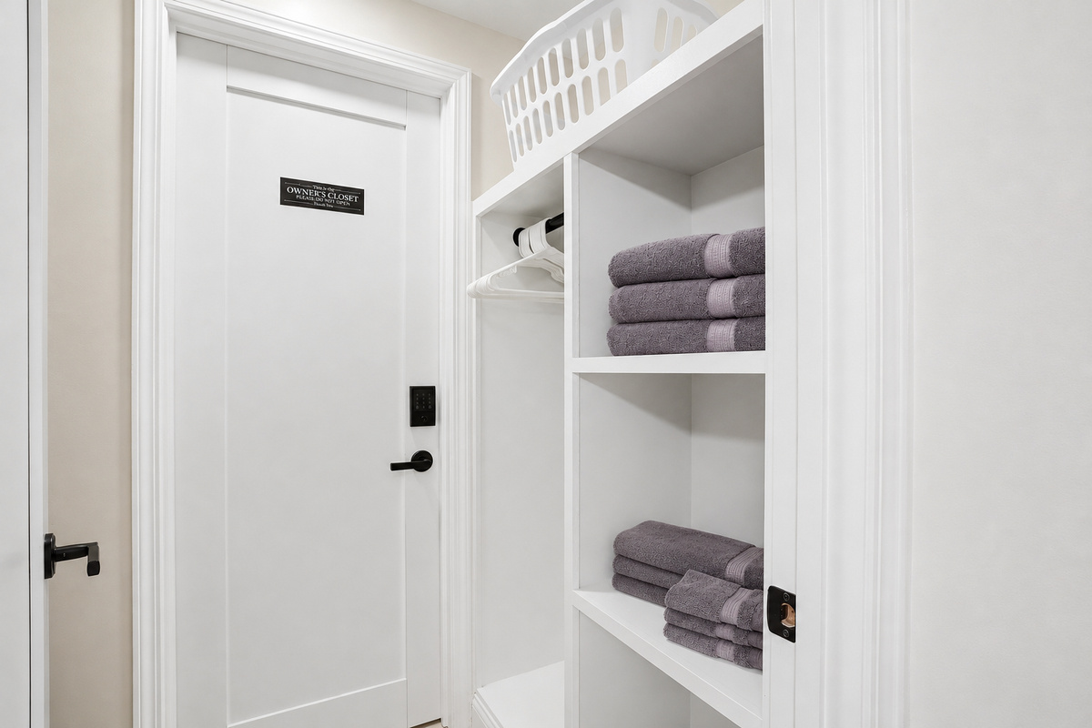 Clean, organized linen storage area designed for guest convenience. Built-in shelving provides neatly stacked towels and essentials, paired with a modern, minimal design for a fresh and hotel-like feel. Located conveniently near the bathroom, this dedicate