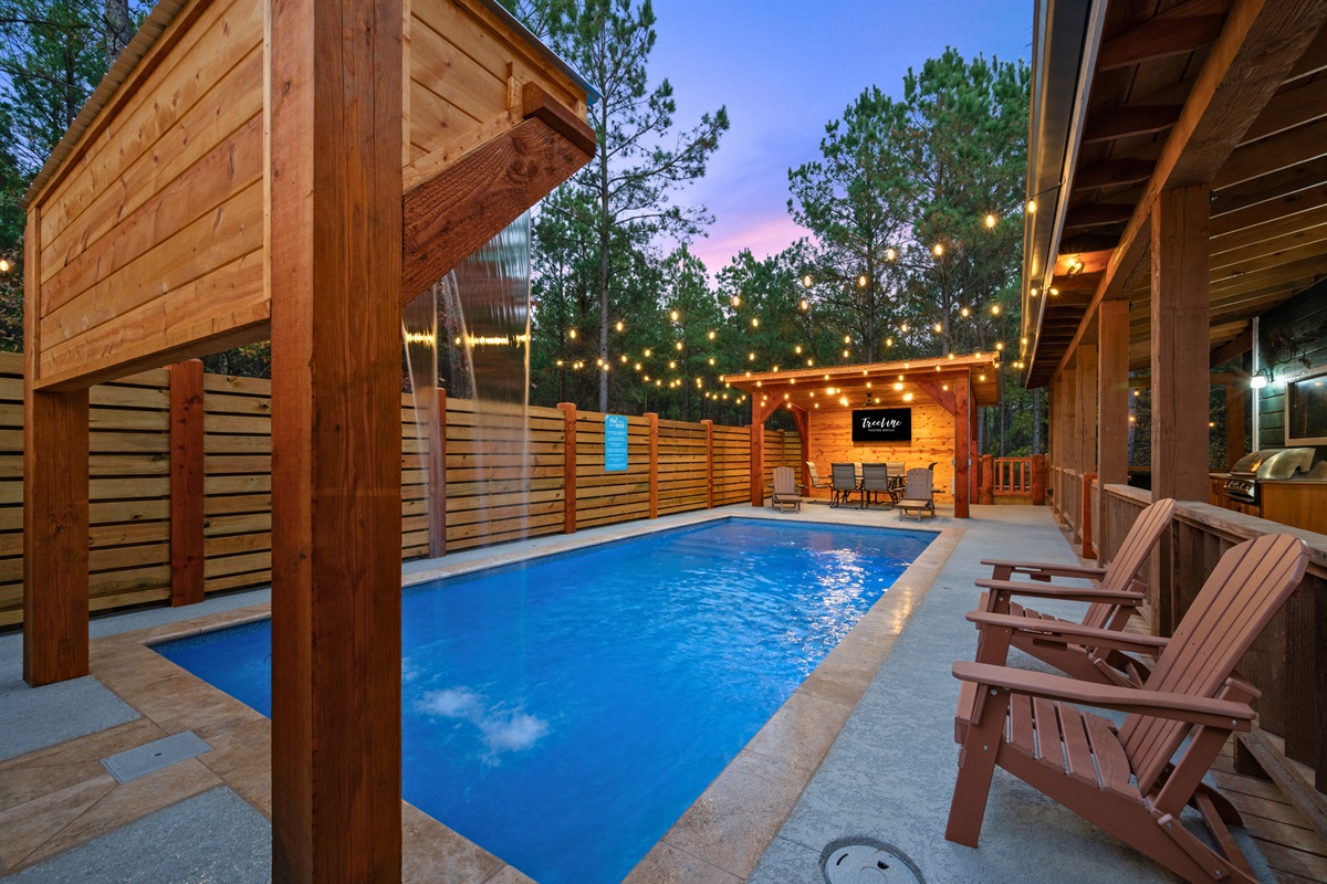 Here’s another look at the pool area, giving you plenty of room to spread out between the chairs, deck, and water.