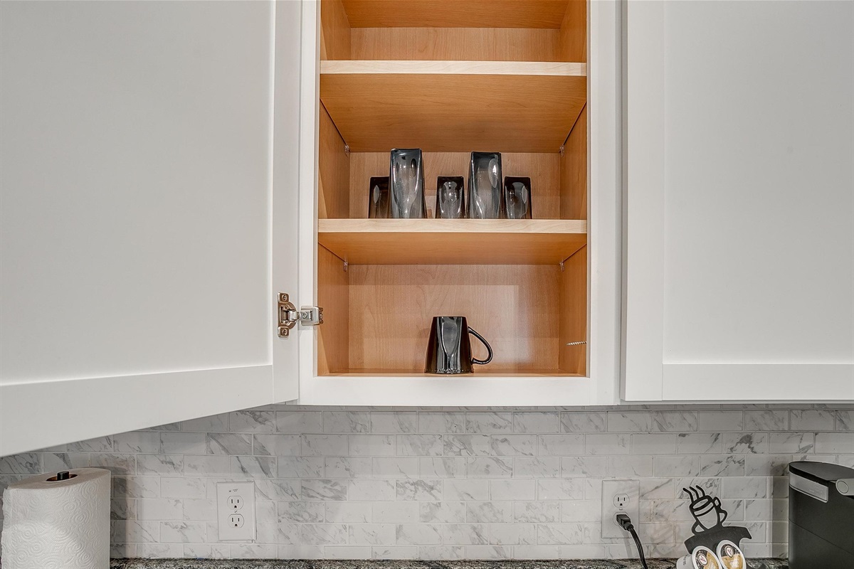 Everyday mugs and coffee essentials organized and easy to find.