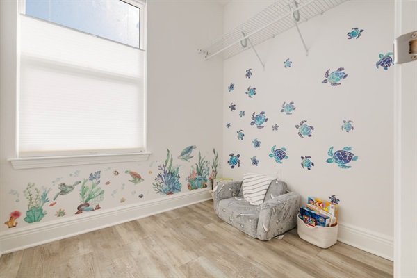 Inside the gated dedicated kid's playroom, which is a converted closet.