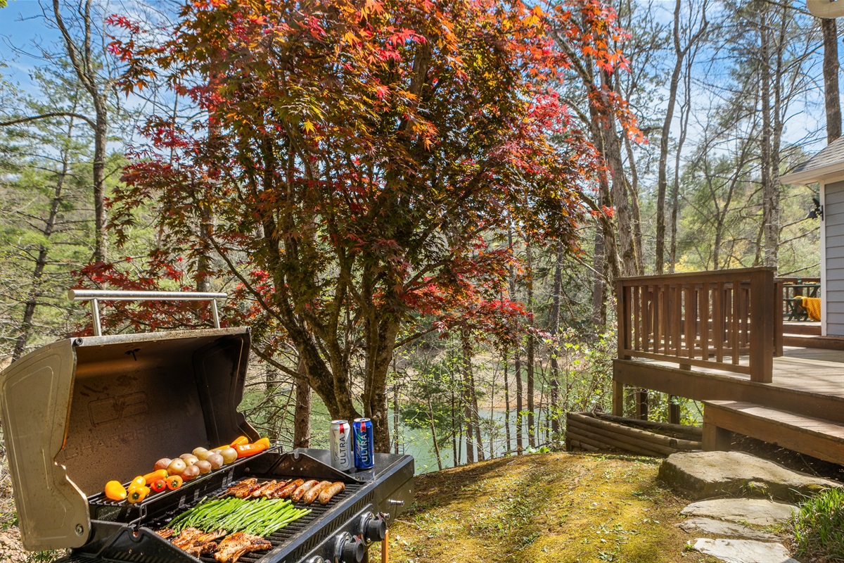Outdoor Oasis: Sizzle up your favorites on the grill while soaking in serene forest views!