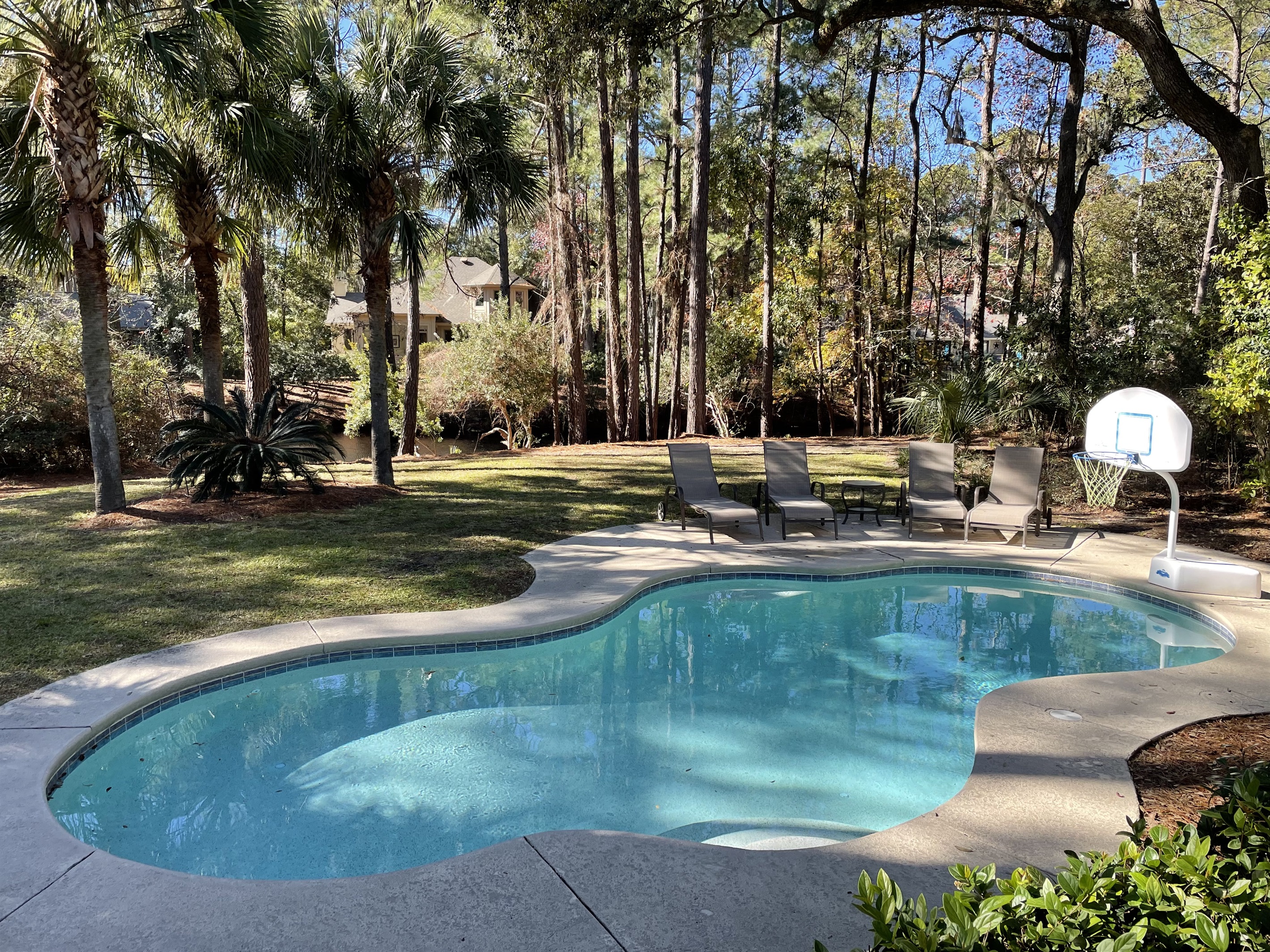 Backyard and pool overlooking lagoon