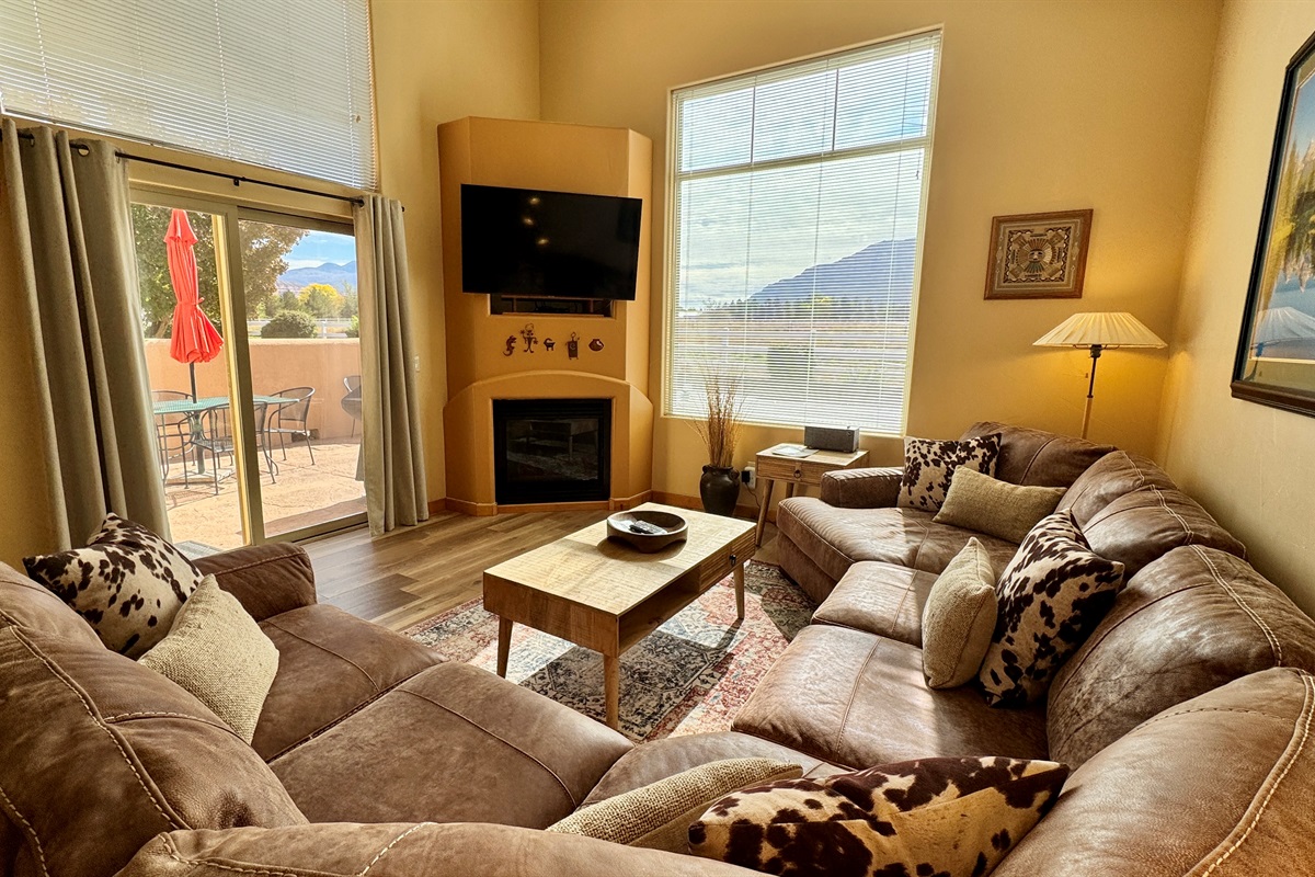 Spacious living area with large leather sectional and huge views!