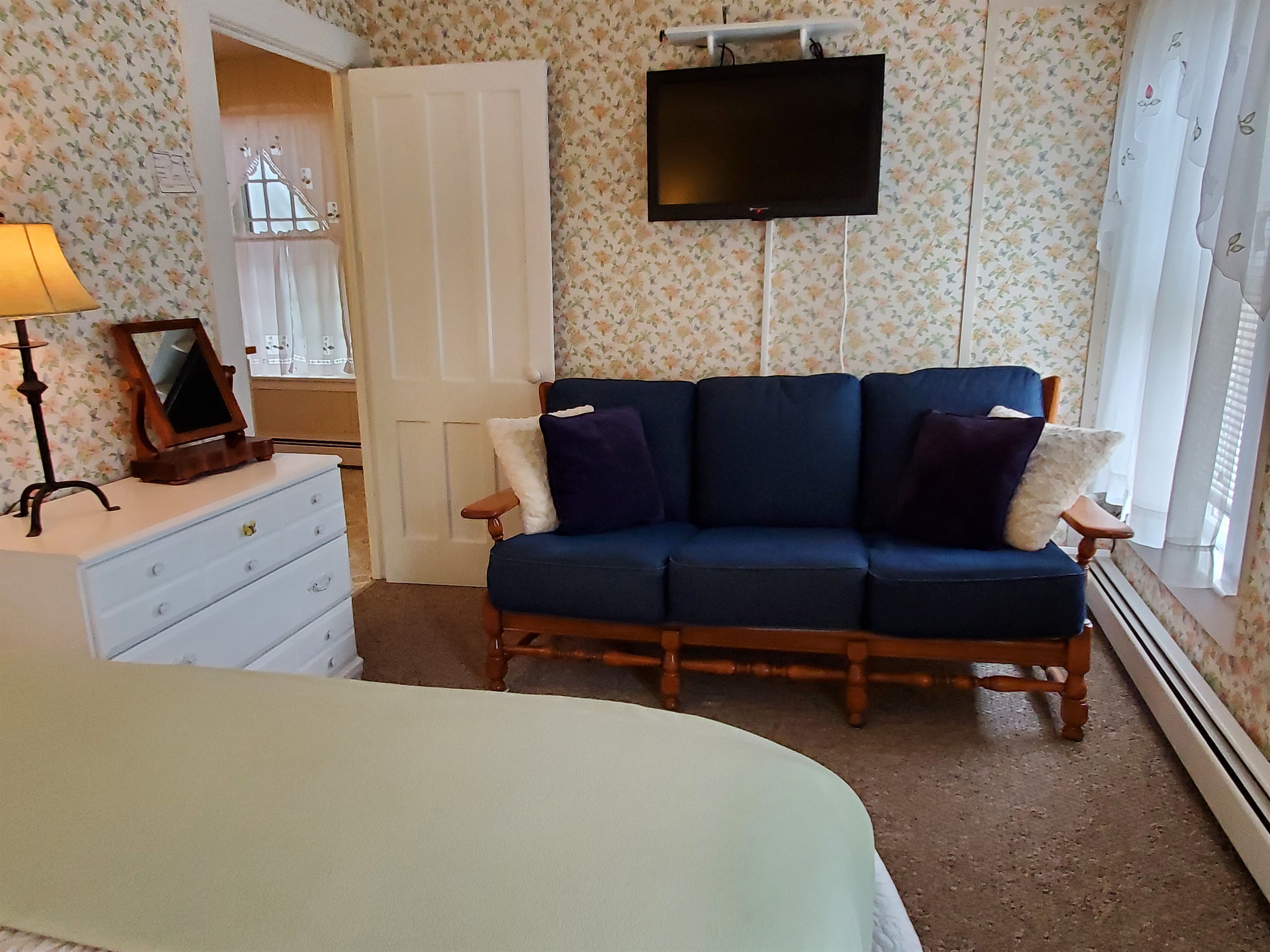 Seating in queen bedroom