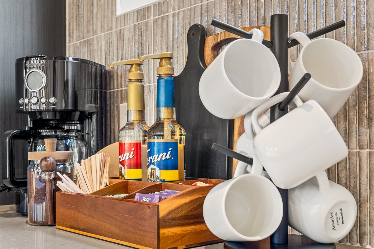 Begin your day with a well-appointed coffee and tea setup, designed for easy mornings and relaxed moments.