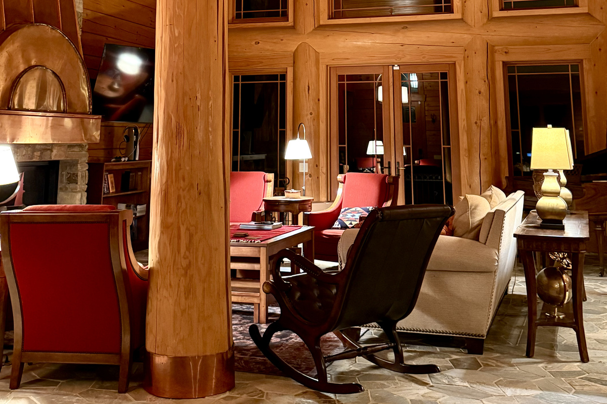 As the sun goes down, the open-concept living room becomes the perfect retreat for cozy conversations, games, or a quiet night in.