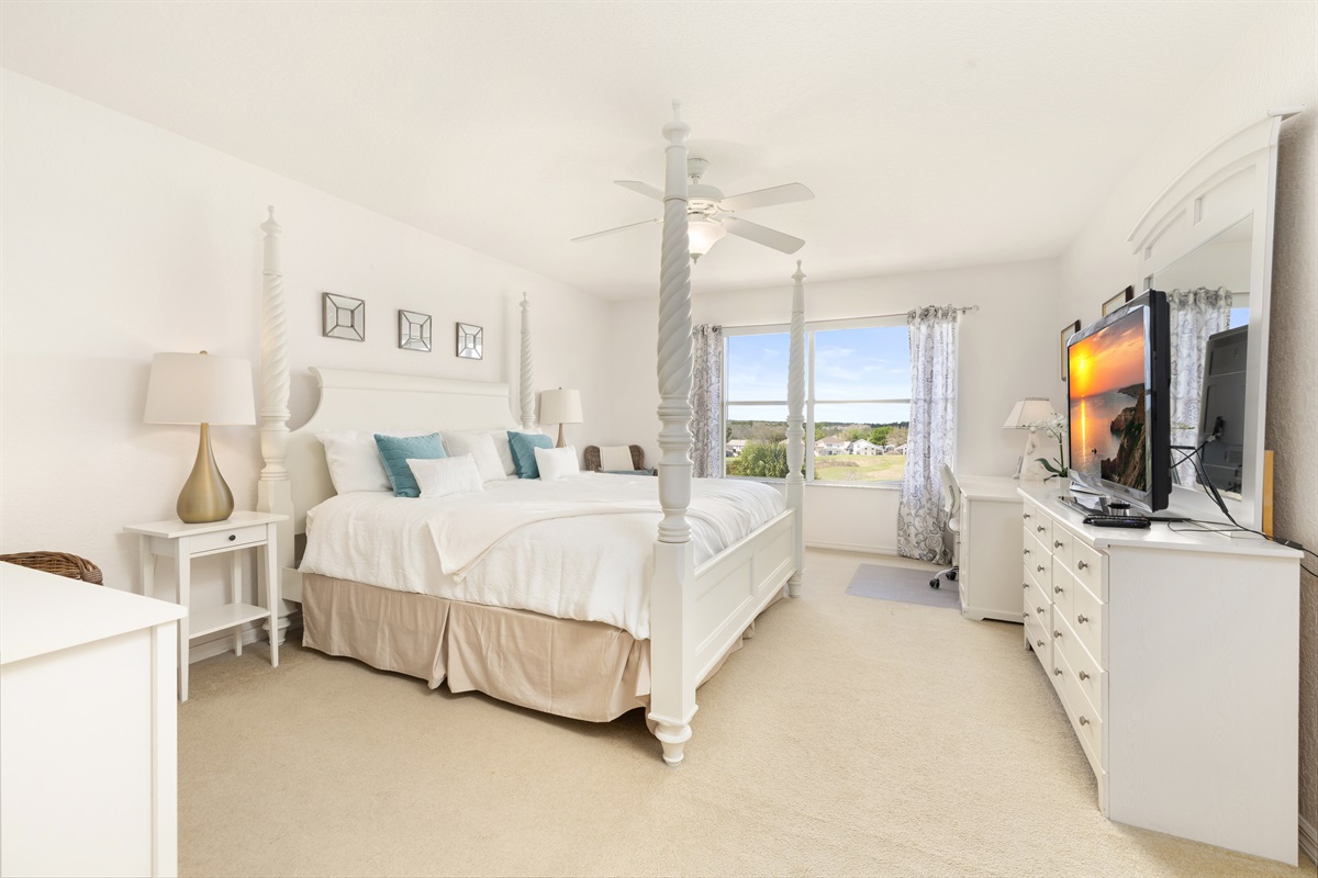 The king master suite with beautiful views of the 16th hole fairway.