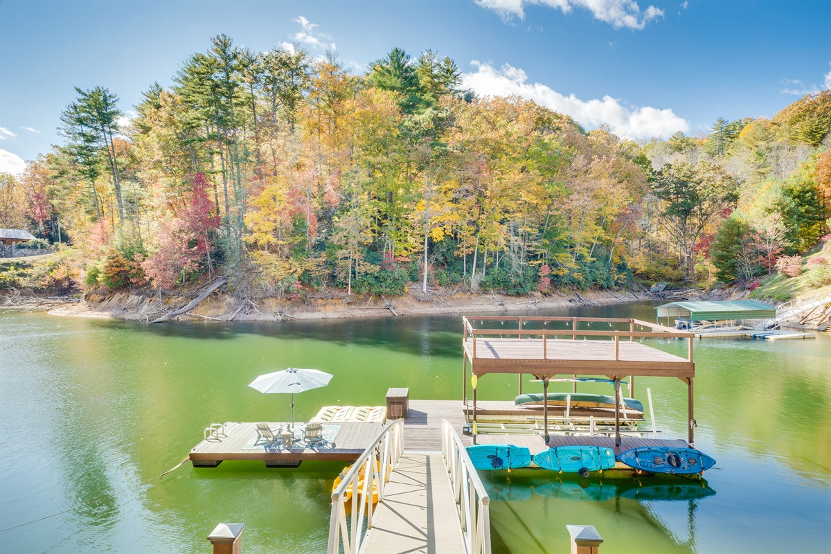 Private dock, kayaks, paddle board, paddle boat, lounge chairs, umbrella, swim