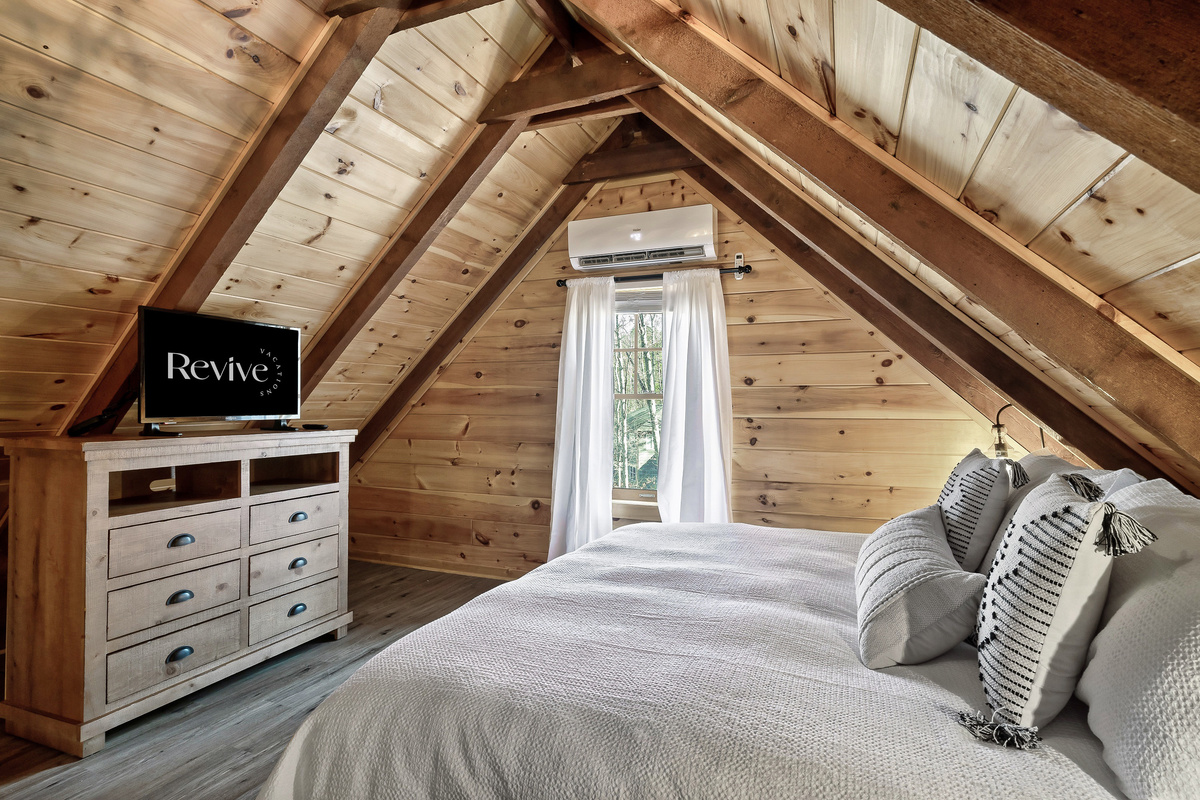 Relax in bed while enjoyng your favorite shows on TV.