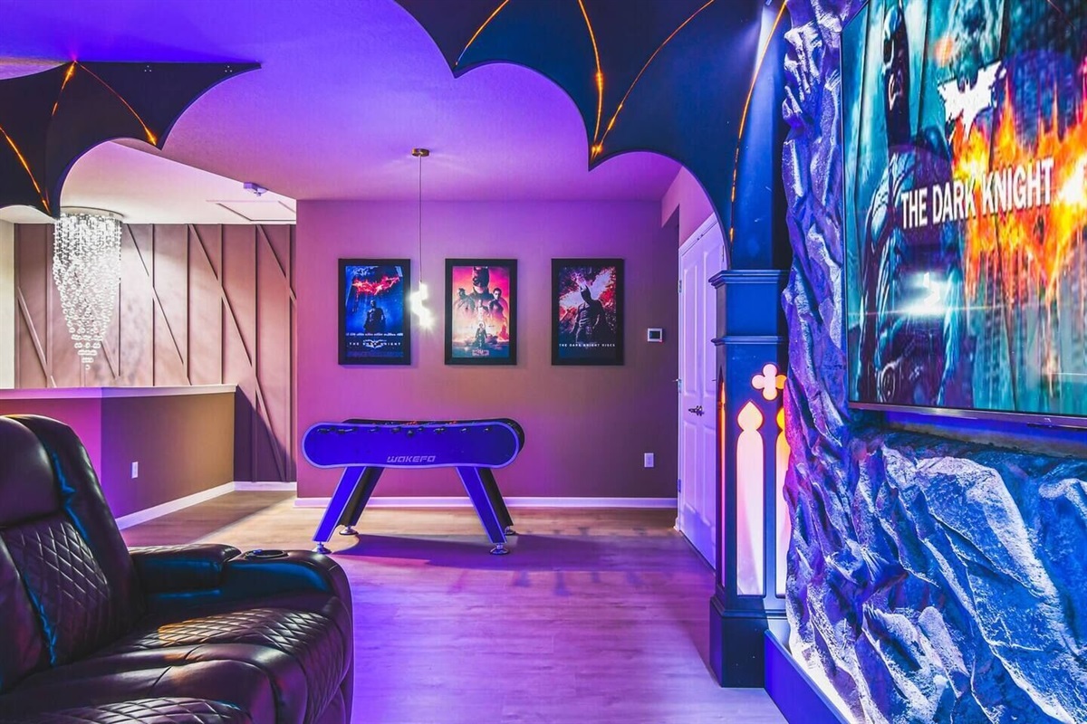 Immerse yourself in the ultimate Batman-themed movie theatre, complete with cinematic details and a foosball table for added fun between films!