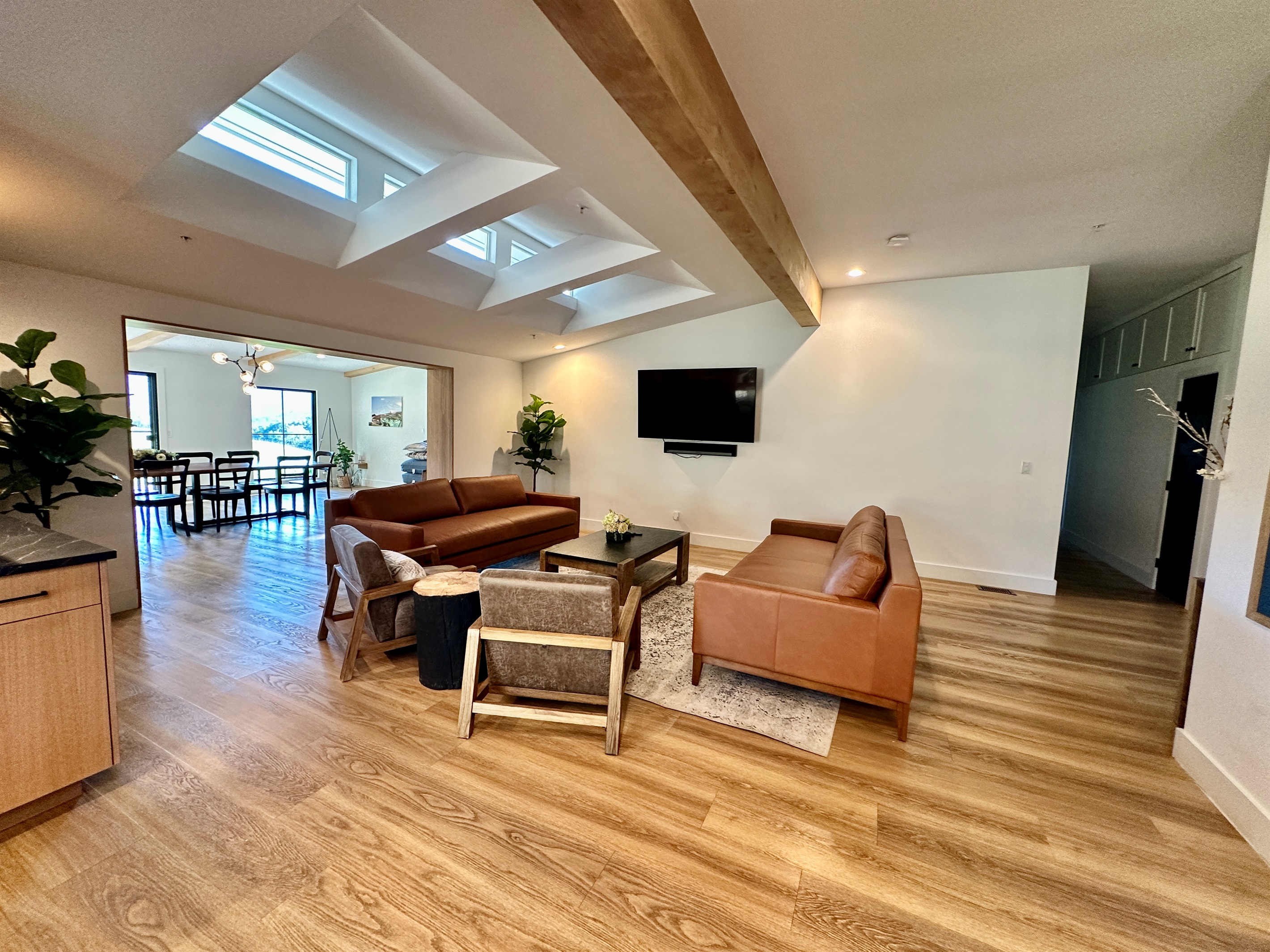 Relax in this stylish living room while streaming your favorite shows or gathering with friends.