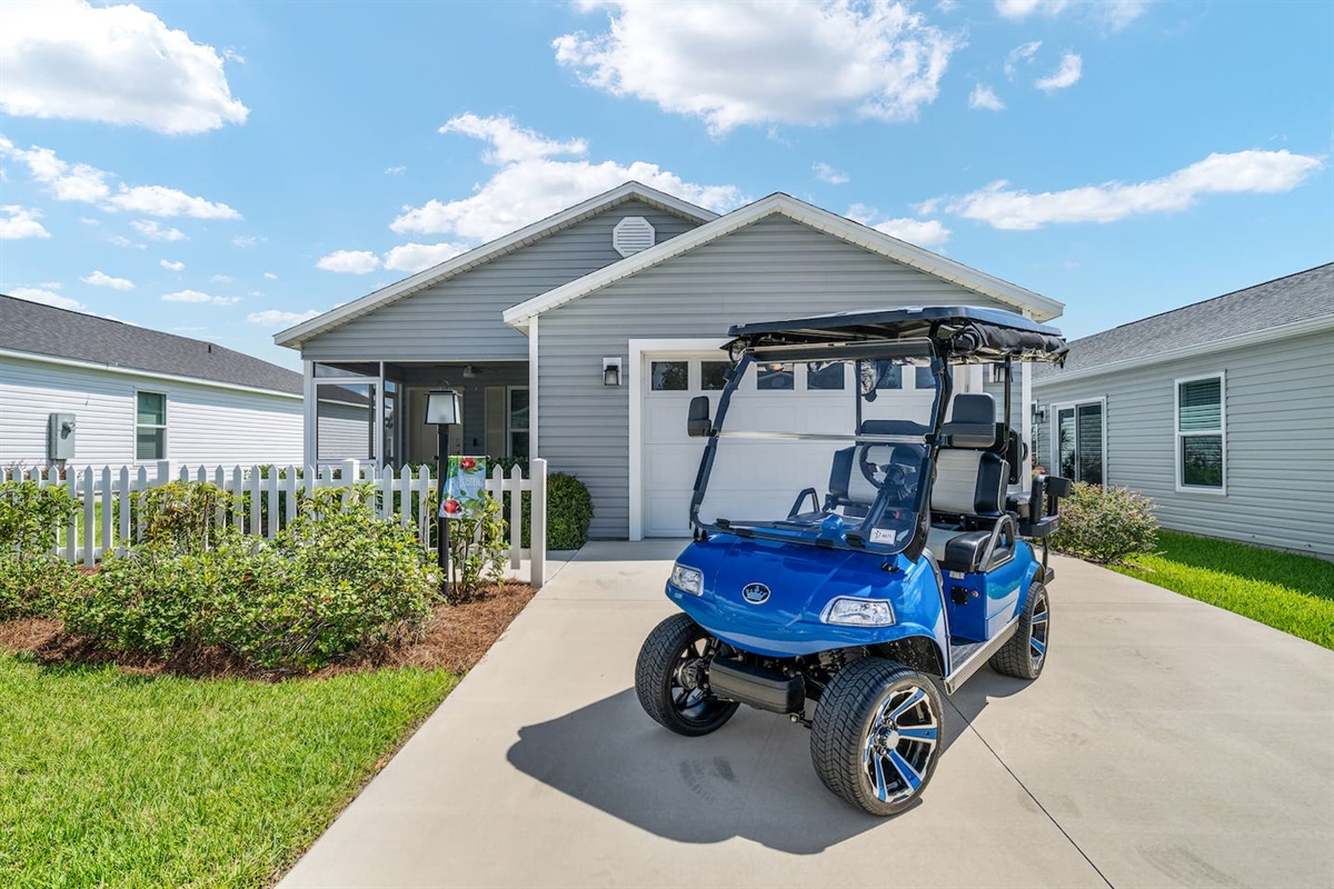 This beautiful villa also includes an electric golf cart.
