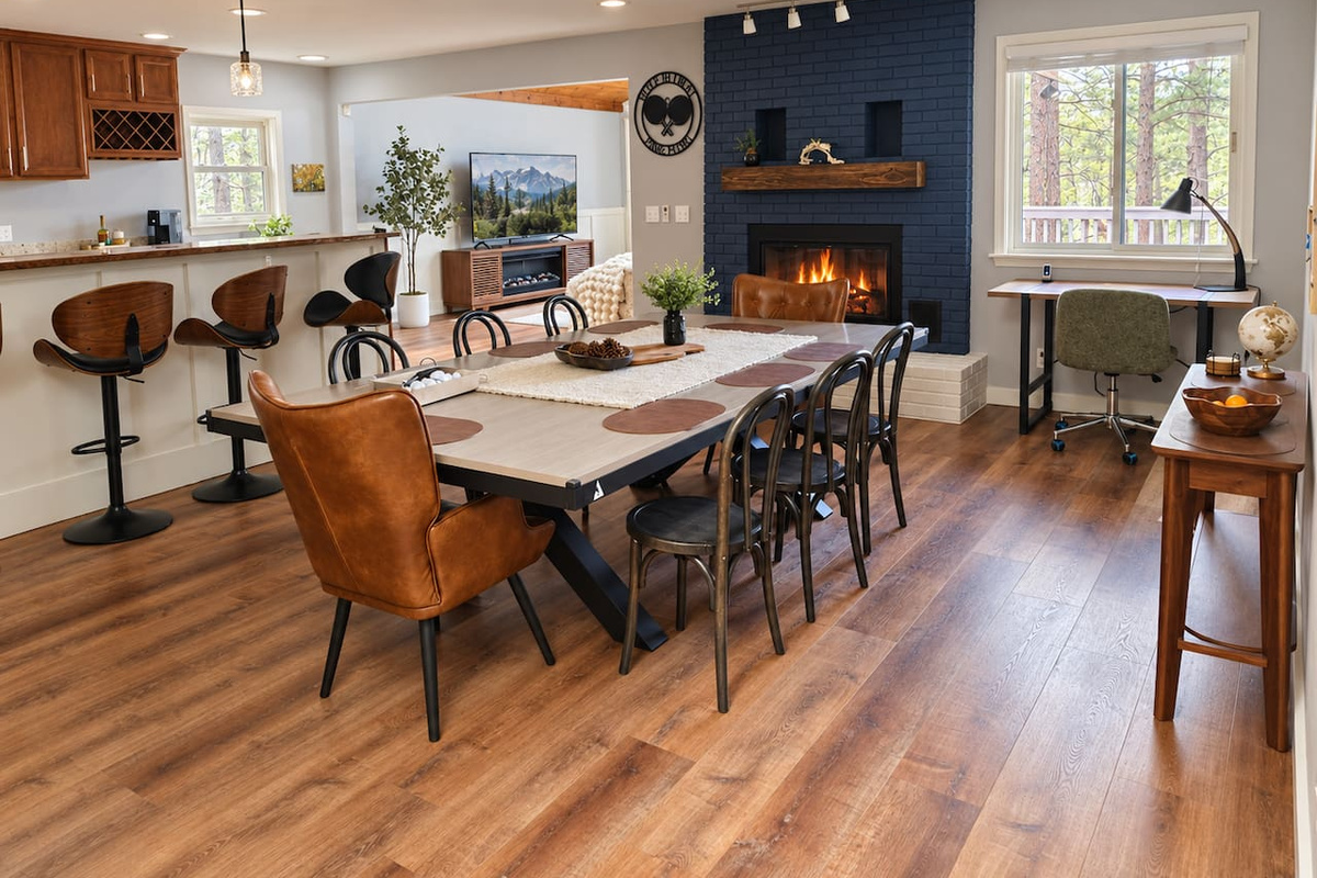 Gather around the full-size dining table with seating for up to 12, use it as a spacious buffet for group meals, or add the net to convert it to a full-size ping-pong table for some friendly competition. Plus, 4 additional seats at the bar.