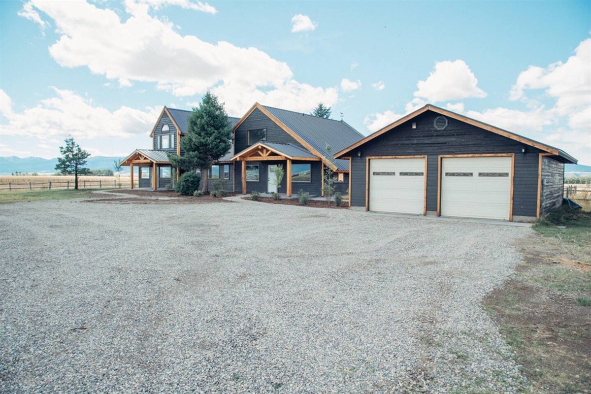 The spacious driveway provides plenty of room for parking.