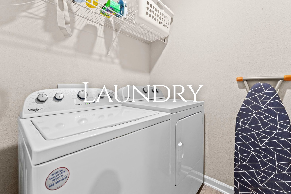The laundry area adds everyday convenience, especially after beach days, outdoor adventures, or longer stays.