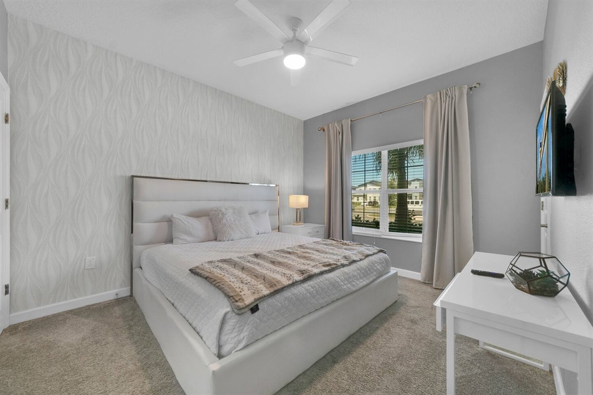 The queen bedroom is beautifully decorated