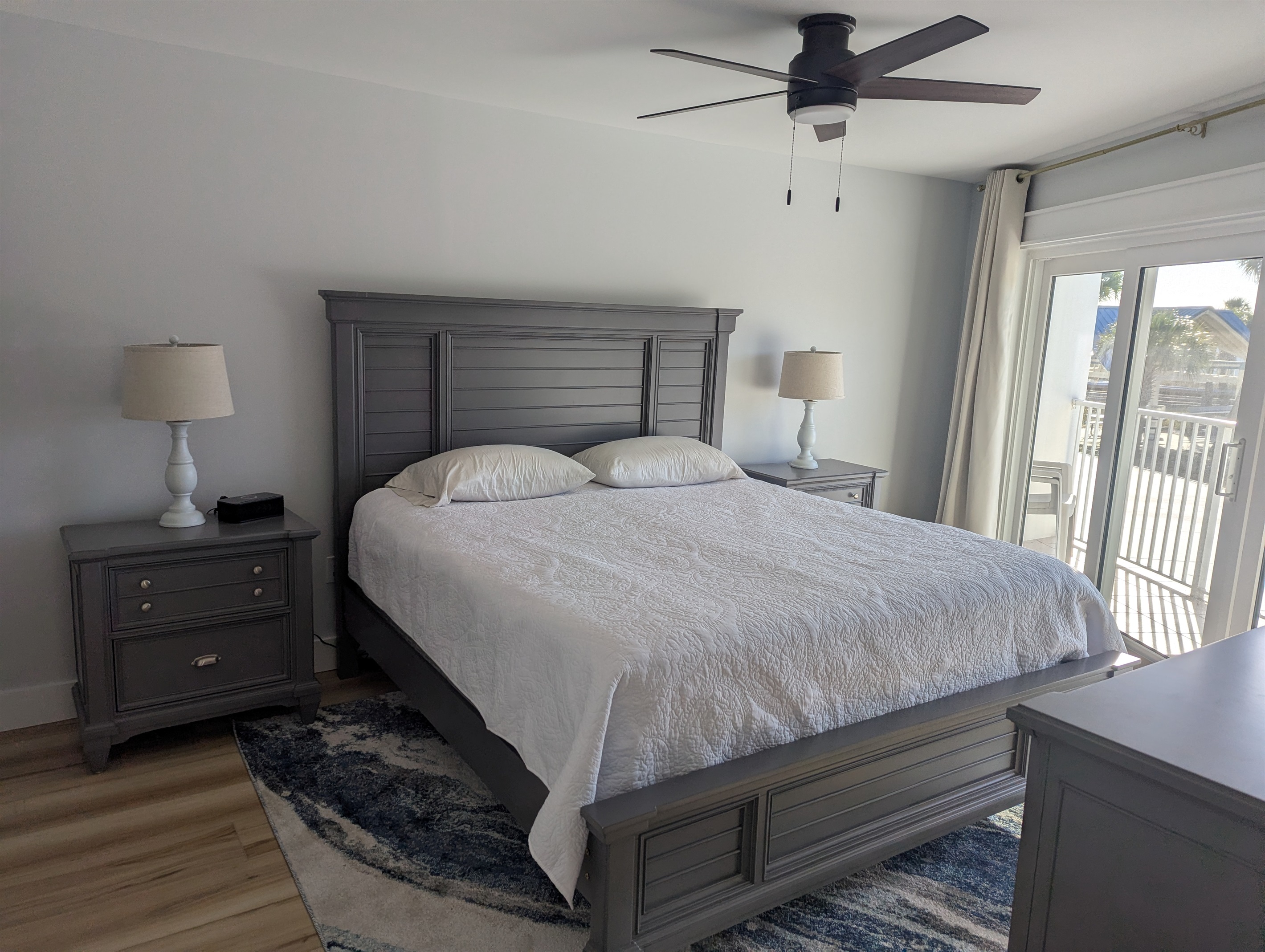 Primary Bedroom with King Size Bed and Patio Access