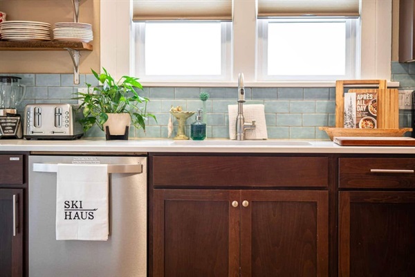 Whether you're prepping a meal or grabbing a drink, you'll love the direct view of the back patio and the open layout that keeps you connected with your guests.