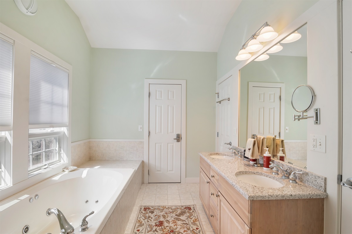 Soak your cares away in the jetted tub in primary bathroom 